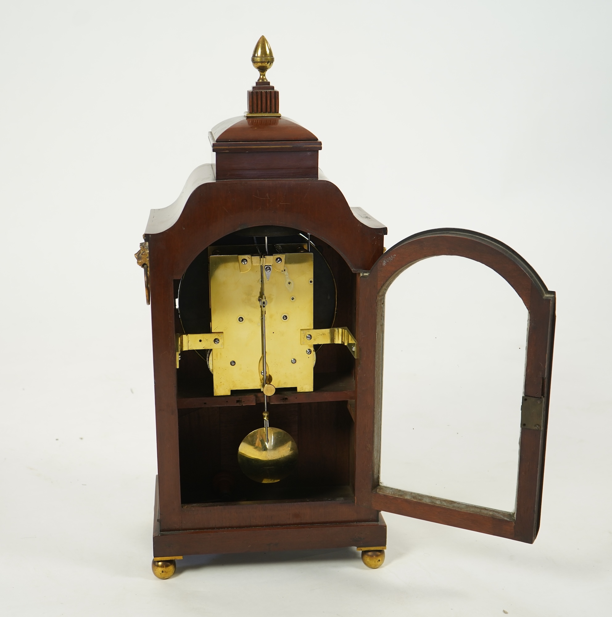 A Regency mahogany and cut brass inlaid bracket clock